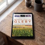 E-book „Rewitalizacja gleby” na tablecie na dębowym stole przy oknie